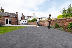 If a classic, high-quality new driveway is what your home is calling out for, look no further than Drivesett&#174; Tegula Original block paving. This range of robust concrete paving stones is one of the UKs most popular driveway choices and renowned for its lasting performance.

Contemporary sizing blended with a subtly distressed finish means it is not just about the substance, it delivers on style too. With a choice of three block sizes and six popular colour blends, this traditional paving option is perfect for creating your dream driveway, no matter how ambitious your design. Drivesett Tegula block paving is the definitive choice. It’s one our most popular products – and it’s clear to see why.

All driveways will require some form of edge restraint for long-lasting structural stability, so we’ve created a range of kerbs to perfectly complement the classic look of Drivesett&#174; Tegula block paving.