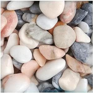 Flamingo Pebbles are mostly rounded pebbles, which are a beautiful mix of pastel pink, cream, and grey. This 20-50mm sized pebble is ideal for rockeries and borders.